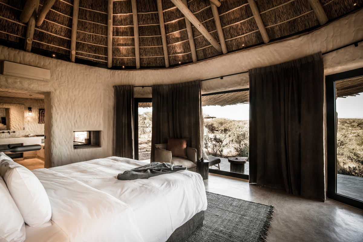 Hypnos bed in Namibian hotel, Zannier Omaanda, bed-view looking out of window