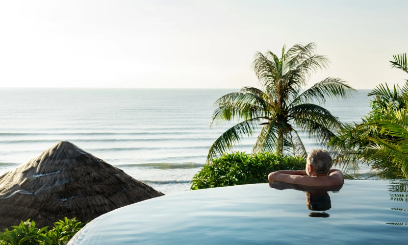 A man in an infinity pool