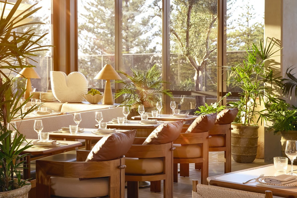 wooden furniture and plants in Haven restaurant Mondrian Gold coast