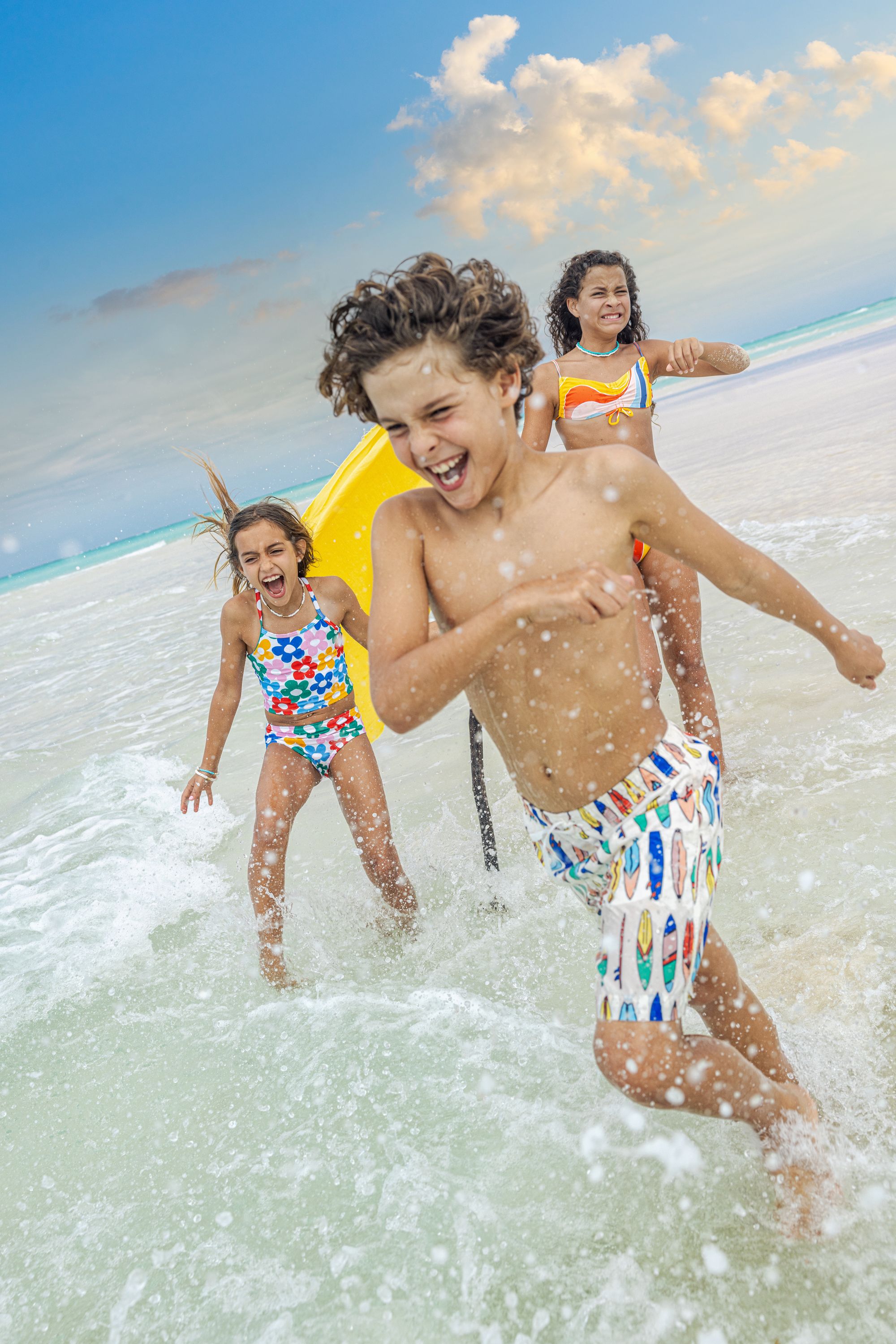 kids running on beach